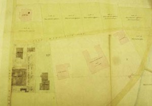 The 15 acre site leased at Shanghai in 1846, drawn in 1866. The consul’s residence, two vice-consul houses, gatehouse and jail are shown pink. The dark buildings on the left were used by the Admiralty. The lotted sites at the top had already been sold. (North is to the right.)