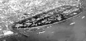 Shameen Island in Canton, largely reclaimed and entirely embanked 1858-61 to create British and French concession areas. Taken from the air in about 1920