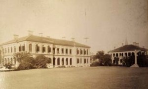 13. Shanghai. Combined consulate offices/Supreme Court building at left, consul’s residence at right, with English Church and flagstaff beyond.