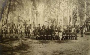 18. Tehran. Min flanked by wife and daughter, staff and escort in the 1920s, among the 50yr old plane trees.