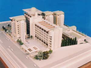 Model from the south-east, with the entrance in the foreground and paved forecourt behind.