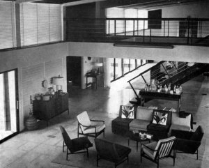 Looking down to entrance hall from first floor access balcony.