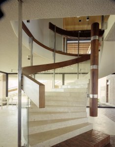 The stair from the hall up to the reception level.