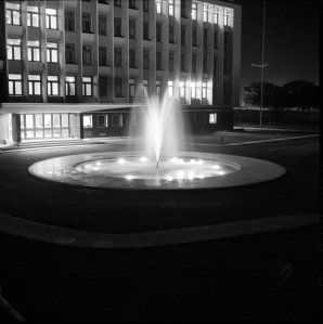 Turning circle outside offices, at night, 1959.