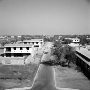 View north from offices, towards residence site, with Lutyens and Baker domes in the distance, 1960.