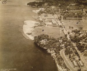 Aerial view, looking north up east bank of Ottawa River , with Earnscliffe in foreground (marked A), 1929.