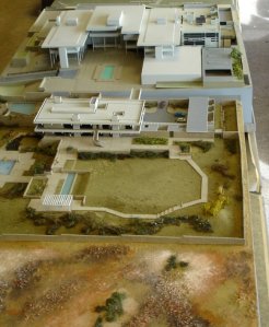Residence model, 1972, in front of c.1966 model of offices, with 1990 new immigration building model inserted.