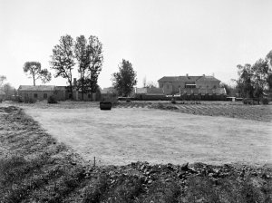 Tennis court under construction, with residence beyond, 1954.