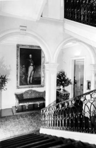 Main stair, with Gen Sir William Beresford on the landing, 1973.
