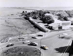 Agency compound after construction of new building and before land reclamation along its northern edge, 1960s.